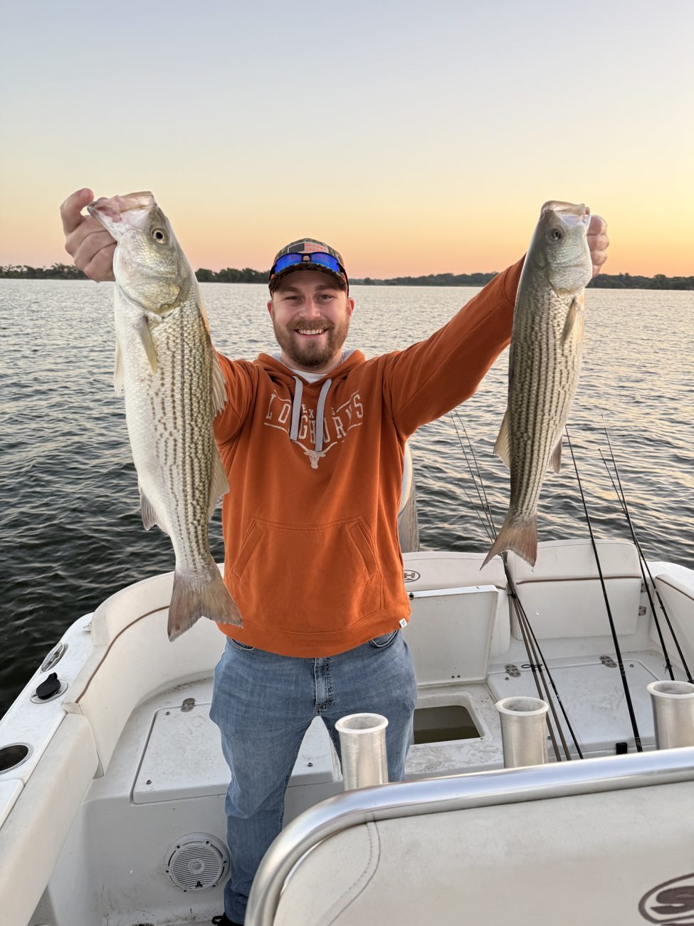Angler with a large striped bass